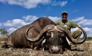 hunter and cape buffalo