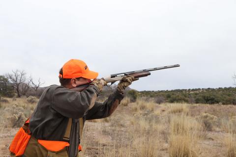 hunter with shotgun